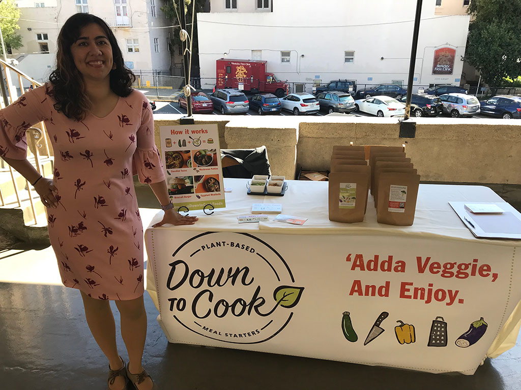 Trishna Saigal selling food at table