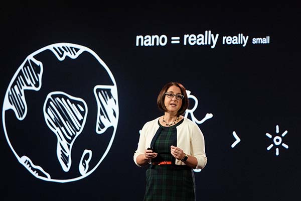 CMU ChemE Associate Professor Katie Whitehead on stage during her TED Talk