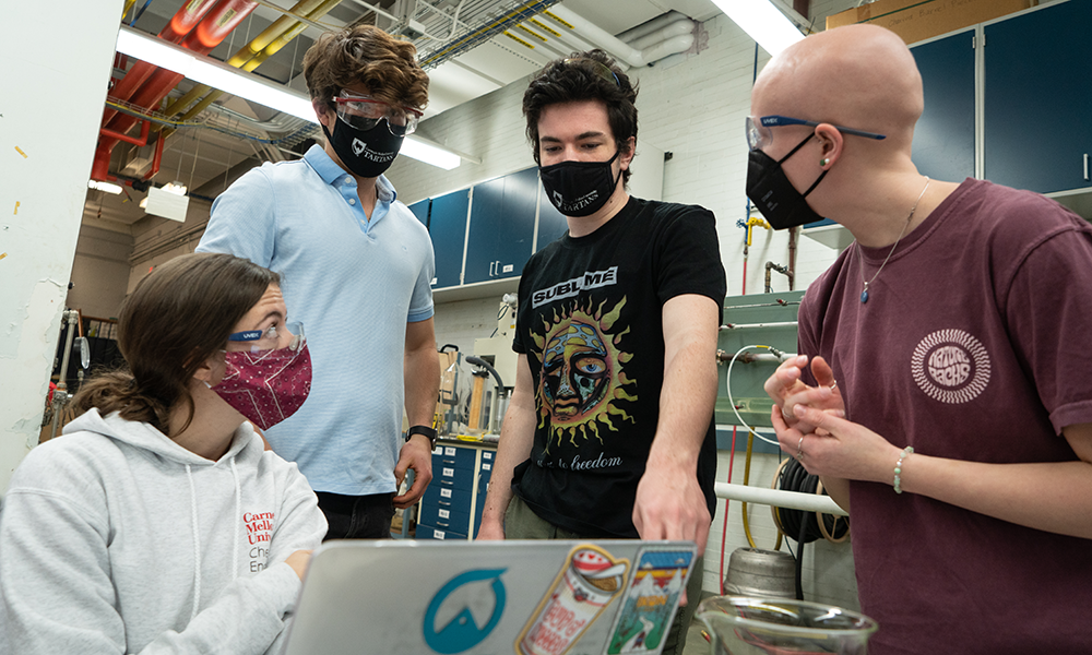 Christian Deem with fellow students in the Rothfus Undergraduate Lab