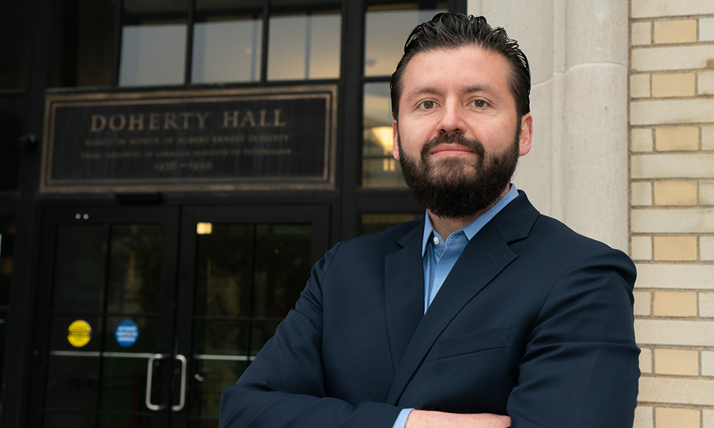 Sebastian Vega standing in front of Doherty Hall